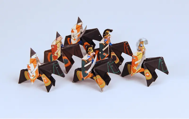 aus Papier gefaltete Reiter