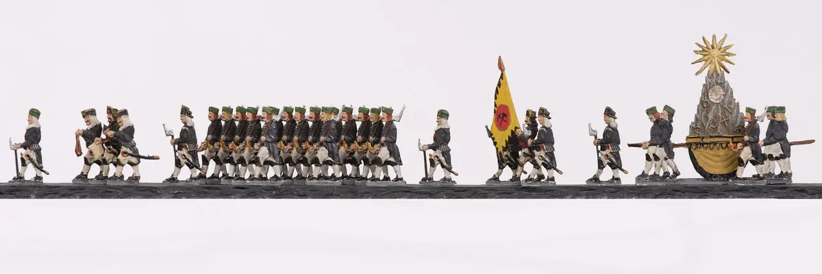 Eine festlich aussehende Parade aus Figuren.